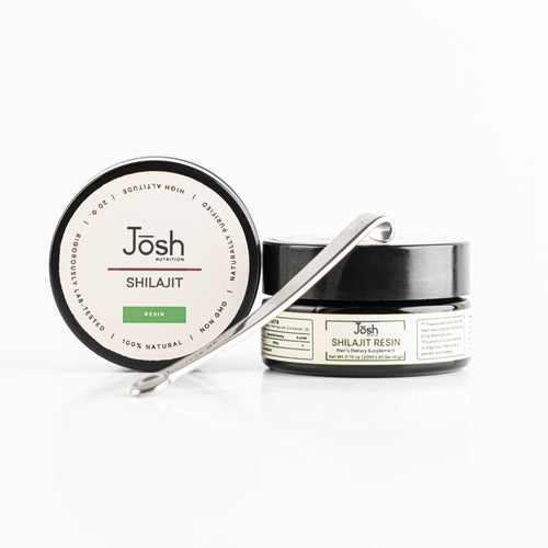 Josh Shilajit resin container with a spoon on a white background