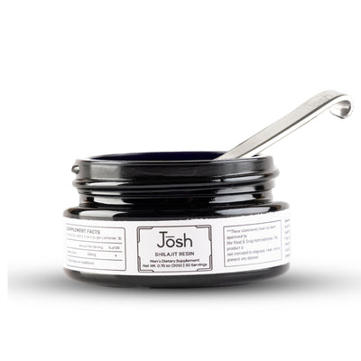 Jar of Josh Shilajit Resin with a spoon on a white background